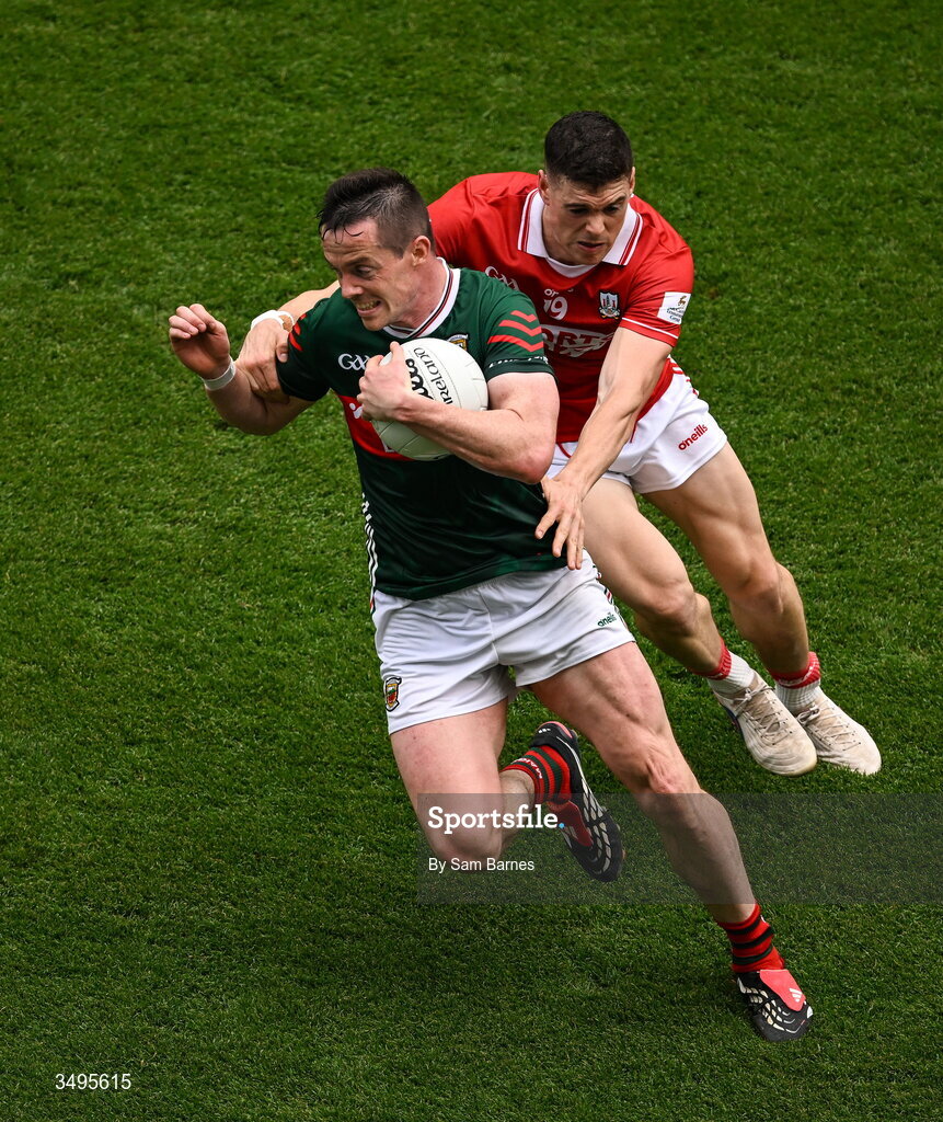 27 June 2026; Stephen Coen of Mayo in action against Rory Maguire of Cork during the GAA Football All-Ireland Senior Championship quarter-final match between Cork and Mayo at Croke Park in Dublin. Photo by Sam Barnes/Sportsfile