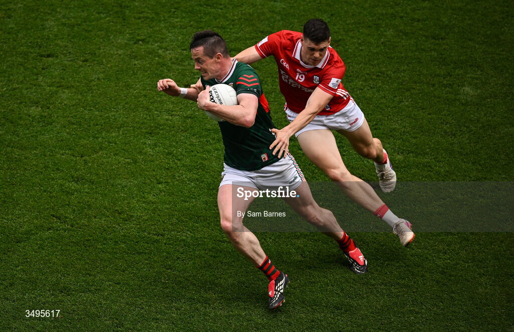 27 June 2026; Stephen Coen of Mayo in action against Rory Maguire of Cork during the GAA Football All-Ireland Senior Championship quarter-final match between Cork and Mayo at Croke Park in Dublin. Photo by Sam Barnes/Sportsfile