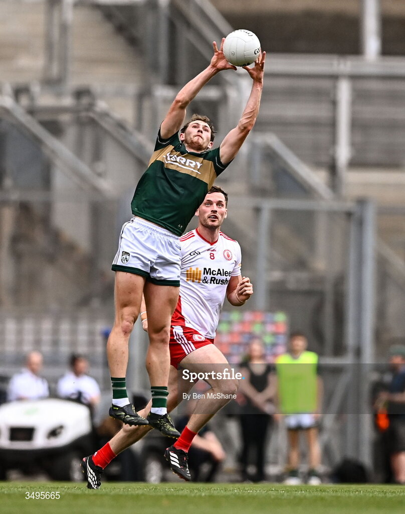 27 June 2026; Seán O'Brien of Kerry wins possession ahead of Brian Kennedy of Tyrone during the GAA Football All-Ireland Senior Championship quarter-final match between Kerry and Tyrone at Croke Park in Dublin. Photo by Ben McShane/Sportsfile