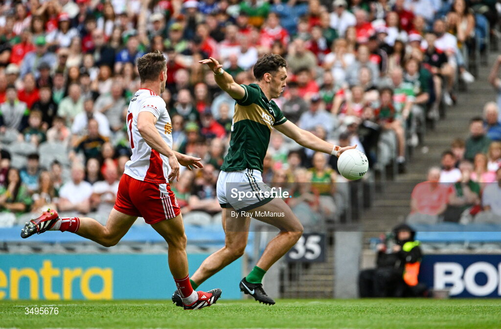 27 June 2026; David Clifford of Kerry scores a goal, in the 20th minute, despite the attention of Kieran McGeary of Tyrone  the GAA Football All-Ireland Senior Championship quarter-final match between Kerry and Tyrone at Croke Park in Dublin. Photo by Ray McManus/Sportsfile
