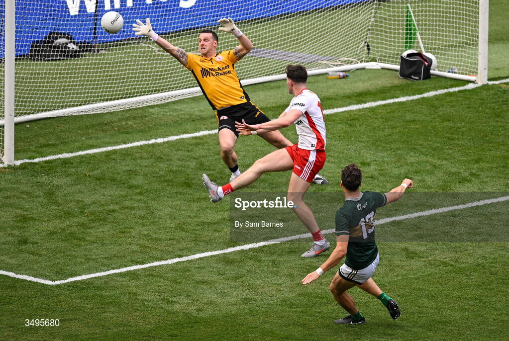 27 June 2026; David Clifford of Kerry scores his side's first goal despite the efforts of Tyrone goalkeeper Niall Morgan and Ciaran Daly of Tyrone during the GAA Football All-Ireland Senior Championship quarter-final match between Kerry and Tyrone at Croke Park in Dublin. Photo by Sam Barnes/Sportsfile