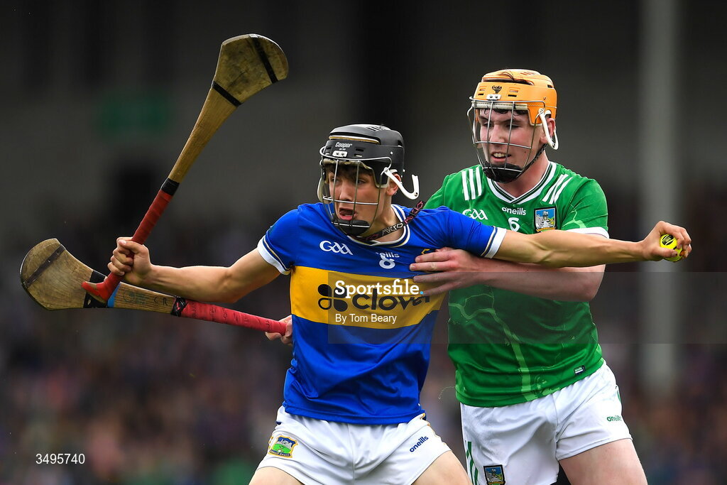 27 June 2026; Shane Ryan of Tipperary is tackled by Conor Ryan of Limerick during the Electric Ireland All-Ireland Minor Hurling Championship final match between Limerick and Tipperary at TUS Gaelic Grounds in Limerick. Photo by Tom Beary/Sportsfile