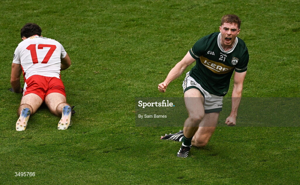 27 June 2026; Armin Heinrich of Kerry celebrates after scoring his side's second goal as Michael Rafferty of Tyrone reacts during the GAA Football All-Ireland Senior Championship quarter-final match between Kerry and Tyrone at Croke Park in Dublin. Photo by Sam Barnes/Sportsfile