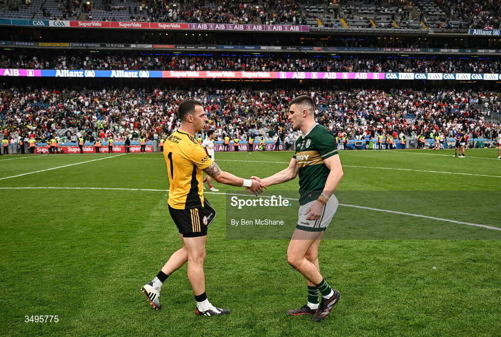 27 June 2026; Seán O'Shea of Kerry with Tyrone goalkeeper Niall Morgan after the GAA Football All-Ireland Senior Championship quarter-final match between Kerry and Tyrone at Croke Park in Dublin. Photo by Ben McShane/Sportsfile