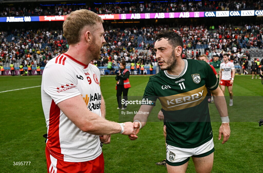 27 June 2026; Paudie Clifford of Kerry with Frank Burns of Tyrone after the GAA Football All-Ireland Senior Championship quarter-final match between Kerry and Tyrone at Croke Park in Dublin. Photo by Ben McShane/Sportsfile