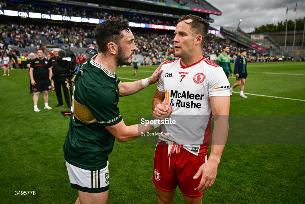 27 June 2026; Paudie Clifford of Kerry with Kieran McGeary of Tyrone after the GAA Football All-Ireland Senior Championship quarter-final match between Kerry and Tyrone at Croke Park in Dublin. Photo by Ben McShane/Sportsfile