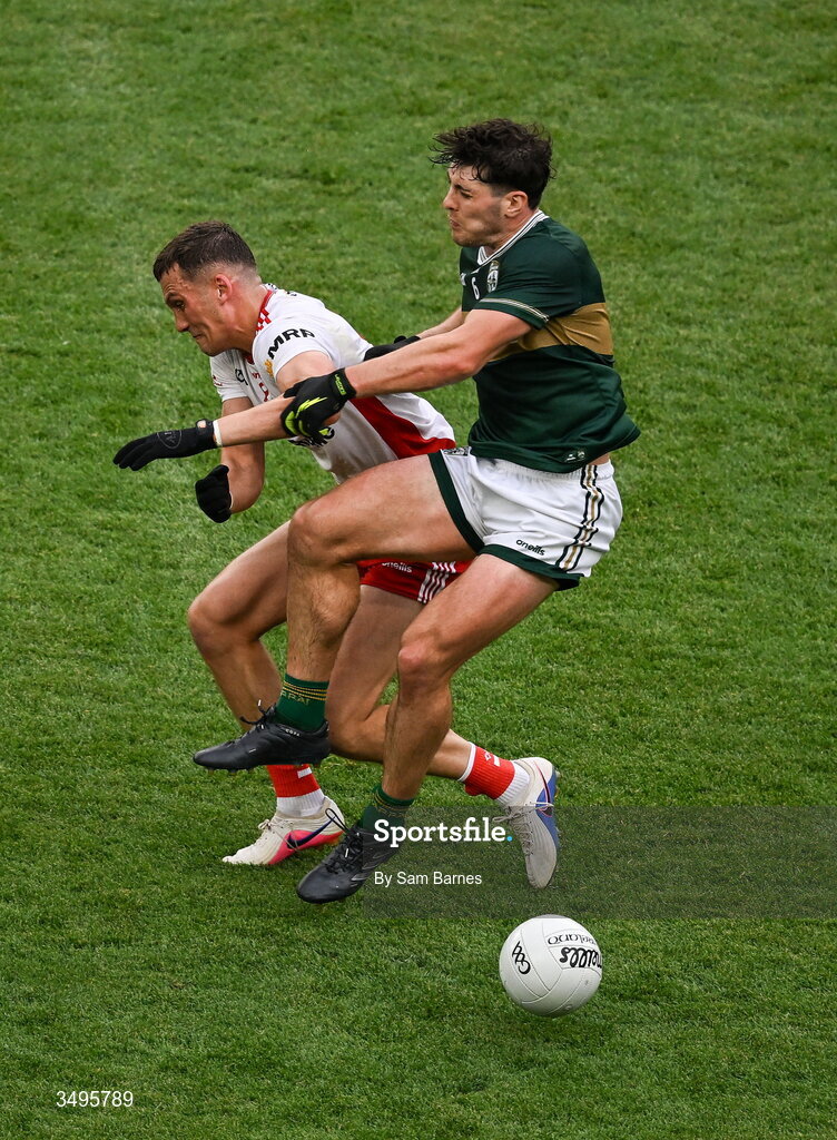 27 June 2026; Mike Breen of Kerry and Conn Kilpatrick of Tyrone collide during the GAA Football All-Ireland Senior Championship quarter-final match between Kerry and Tyrone at Croke Park in Dublin. Photo by Sam Barnes/Sportsfile