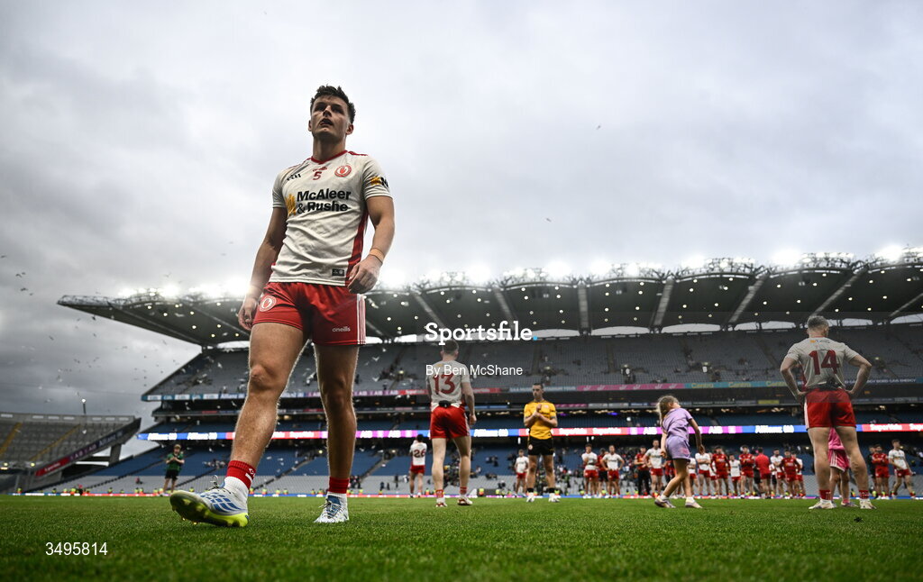 27 June 2026; Michael McKernan of Tyrone makes his way off the pitch after his side's defeat in the GAA Football All-Ireland Senior Championship quarter-final match between Kerry and Tyrone at Croke Park in Dublin. Photo by Ben McShane/Sportsfile
