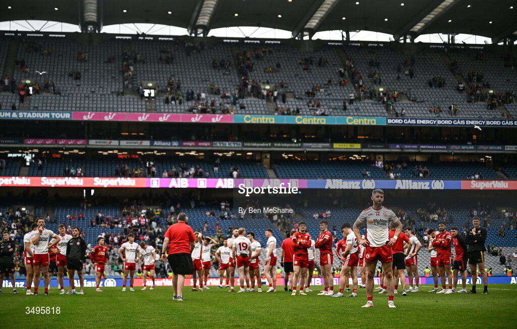 27 June 2026; Tyrone players, including Mattie Donnelly, right, react after their defeat in the GAA Football All-Ireland Senior Championship quarter-final match between Kerry and Tyrone at Croke Park in Dublin. Photo by Ben McShane/Sportsfile