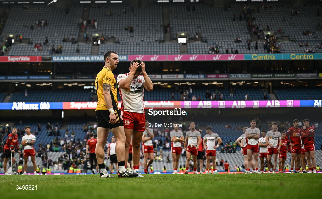 27 June 2026; Michael McKernan of Tyrone, right, and Tyrone goalkeeper Niall Morgan react after their side's defeat in the GAA Football All-Ireland Senior Championship quarter-final match between Kerry and Tyrone at Croke Park in Dublin. Photo by Ben McShane/Sportsfile
