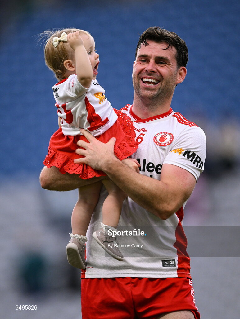 27 June 2026; Darren McCurry of Tyrone, with his daughter Renn, after the GAA Football All-Ireland Senior Championship quarter-final match between Kerry and Tyrone at Croke Park in Dublin. Photo by Ramsey Cardy/Sportsfile