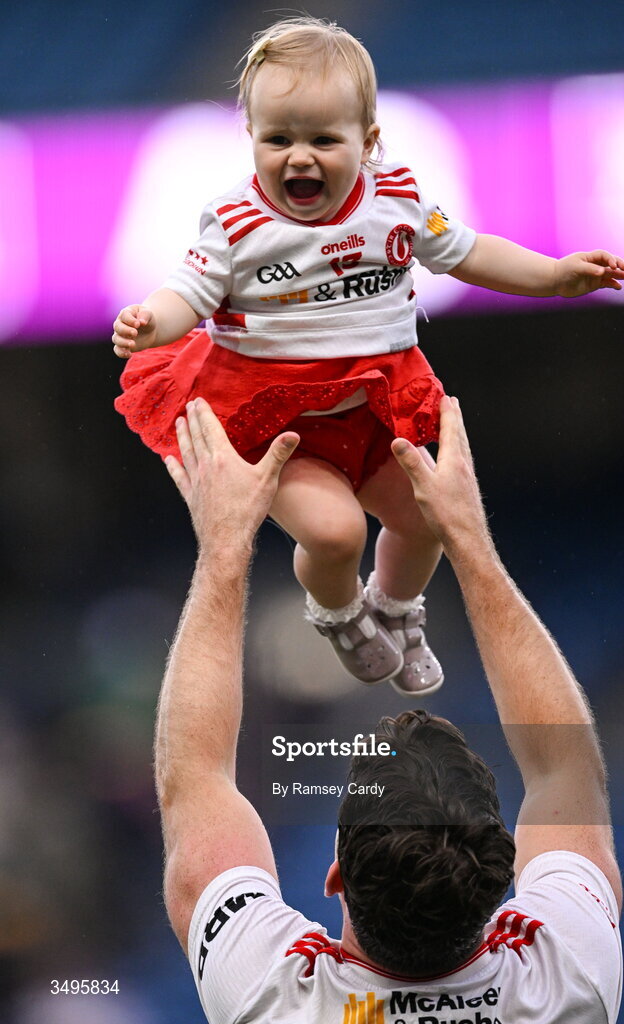 27 June 2026; Darren McCurry of Tyrone, with his daughter Renn, after the GAA Football All-Ireland Senior Championship quarter-final match between Kerry and Tyrone at Croke Park in Dublin. Photo by Ramsey Cardy/Sportsfile