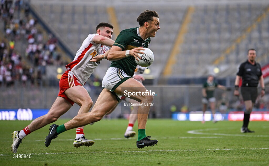 27 June 2026; David Clifford of Kerry in action against Niall Devlin of Tyrone during the GAA Football All-Ireland Senior Championship quarter-final match between Kerry and Tyrone at Croke Park in Dublin. Photo by Ramsey Cardy/Sportsfile