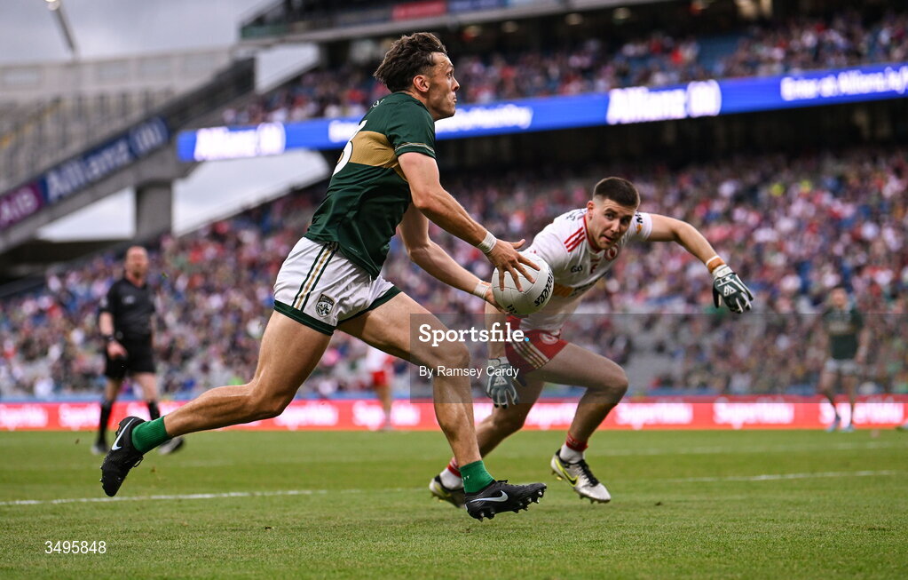27 June 2026; David Clifford of Kerry in action against Niall Devlin of Tyrone during the GAA Football All-Ireland Senior Championship quarter-final match between Kerry and Tyrone at Croke Park in Dublin. Photo by Ramsey Cardy/Sportsfile