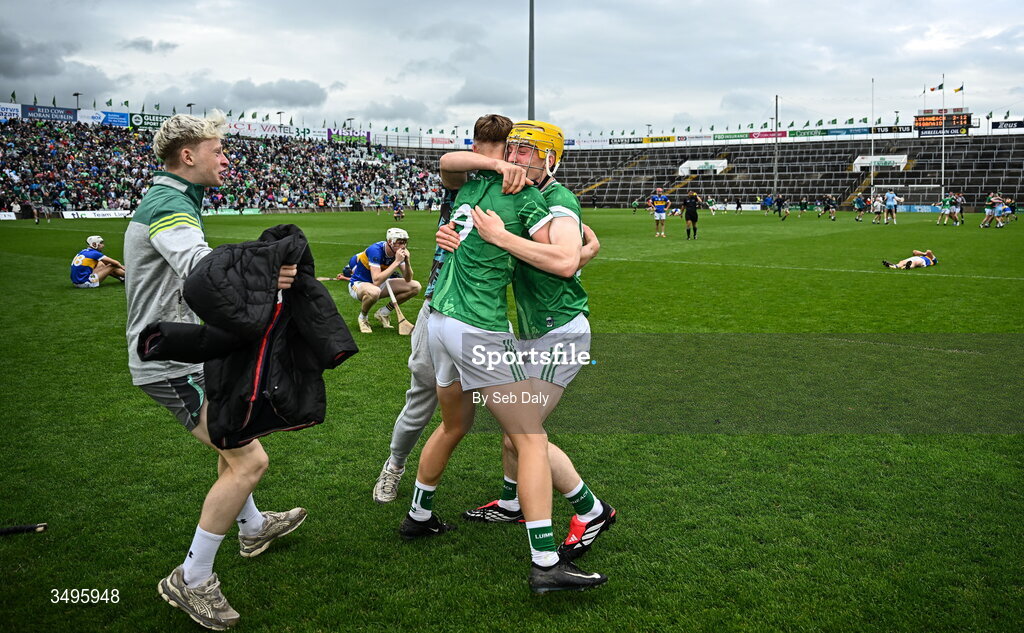 27 June 2026; Limerick players Paul Collins and Jack Roche celebrate after their side's victory in the Electric Ireland All-Ireland Minor Hurling Championship final match between Limerick and Tipperary at TUS Gaelic Grounds in Limerick. Photo by Seb Daly/Sportsfile