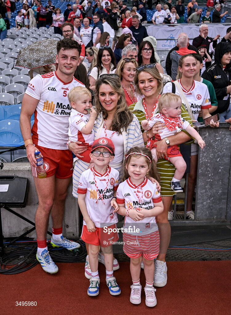 27 June 2026; Michael McKernan of Tyrone with family after the GAA Football All-Ireland Senior Championship quarter-final match between Kerry and Tyrone at Croke Park in Dublin. Photo by Ramsey Cardy/Sportsfile
