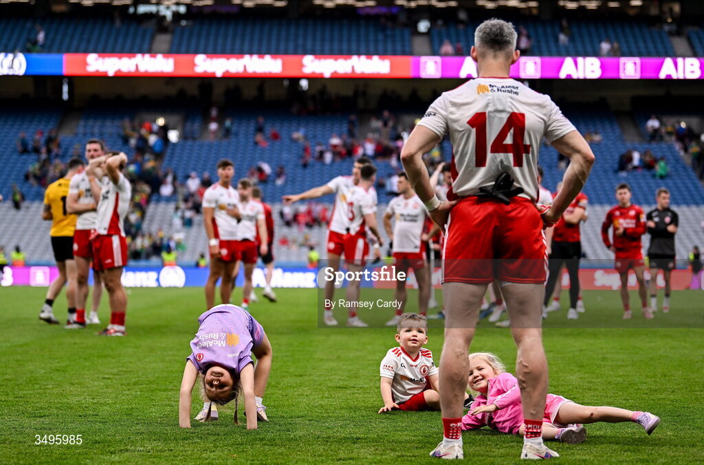27 June 2026; Mattie Donnelly of Tyrone, watches as niece Hallie Courtney performs gymnastics after the GAA Football All-Ireland Senior Championship quarter-final match between Kerry and Tyrone at Croke Park in Dublin. Photo by Ramsey Cardy/Sportsfile