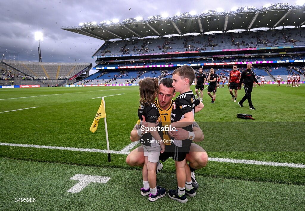 27 June 2026; Tyrone goalkeeper Niall Morgan, with his children Críostaí and Maisie, after the GAA Football All-Ireland Senior Championship quarter-final match between Kerry and Tyrone at Croke Park in Dublin. Photo by Ramsey Cardy/Sportsfile