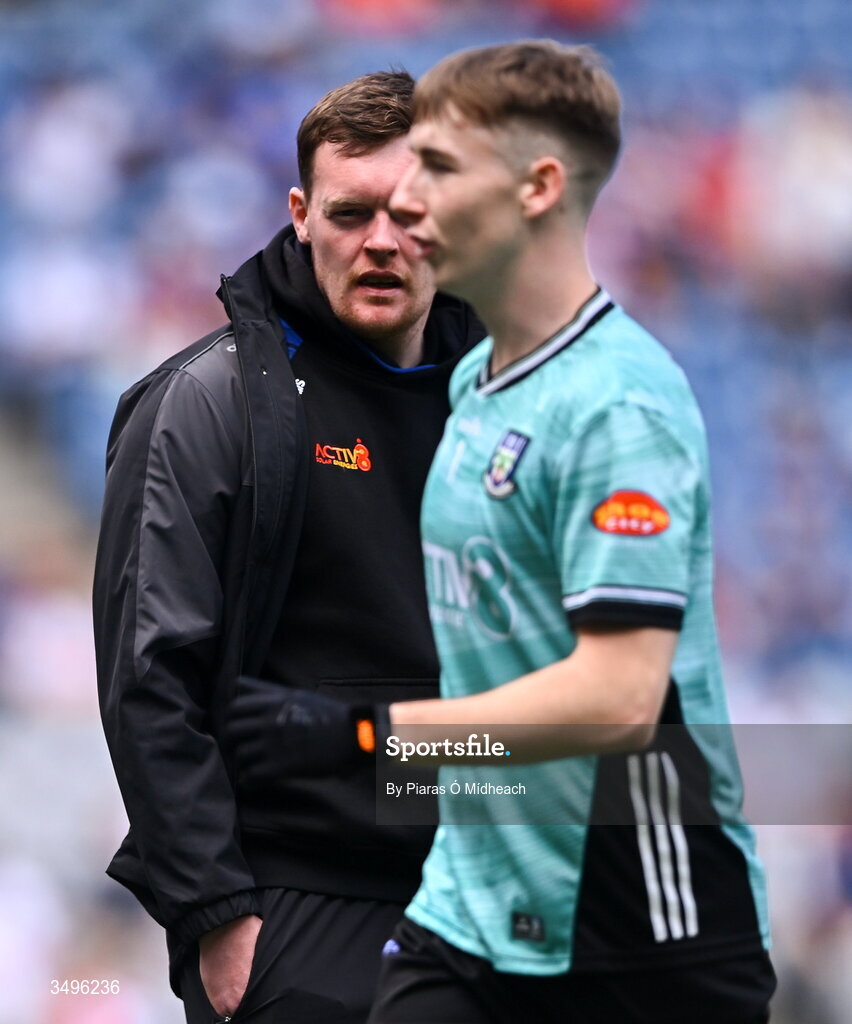 28 June 2026; Injured Monaghan goalkeeper Rory Beggan, left, looks on as Jamie Mooney, who he replaces in the squad, warms up before the GAA Football All-Ireland Senior Championship quarter-final match between Louth and Monaghan at Croke Park in Dublin. Photo by Piaras Ó Mídheach/Sportsfile
