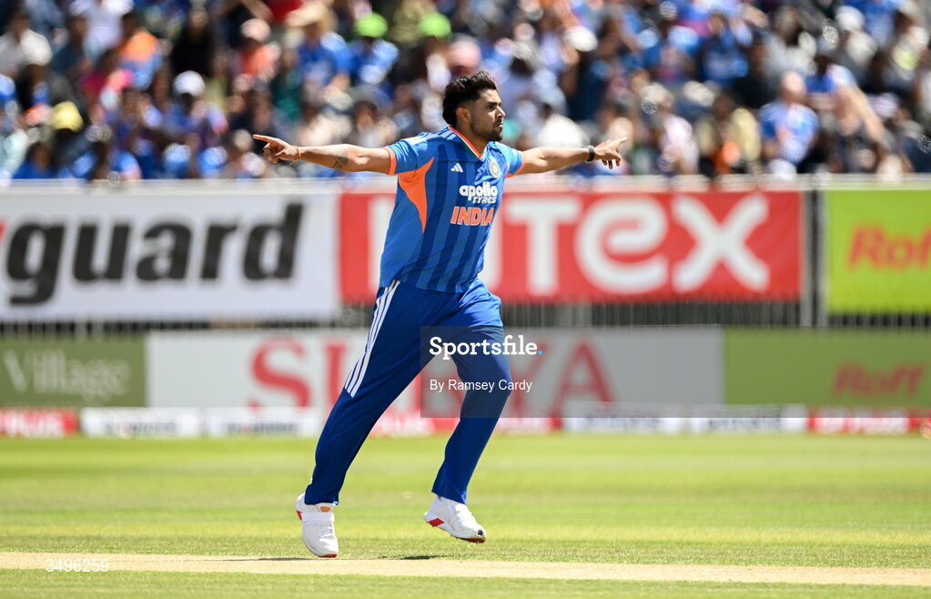 28 June 2026; Harshit Rana of India celebrates taking the wicket of Tim Tector of Ireland during match two of the Spinny Cup Men's T20 International series between Ireland and India at Stormont in Belfast.  Photo by Ramsey Cardy/Sportsfile