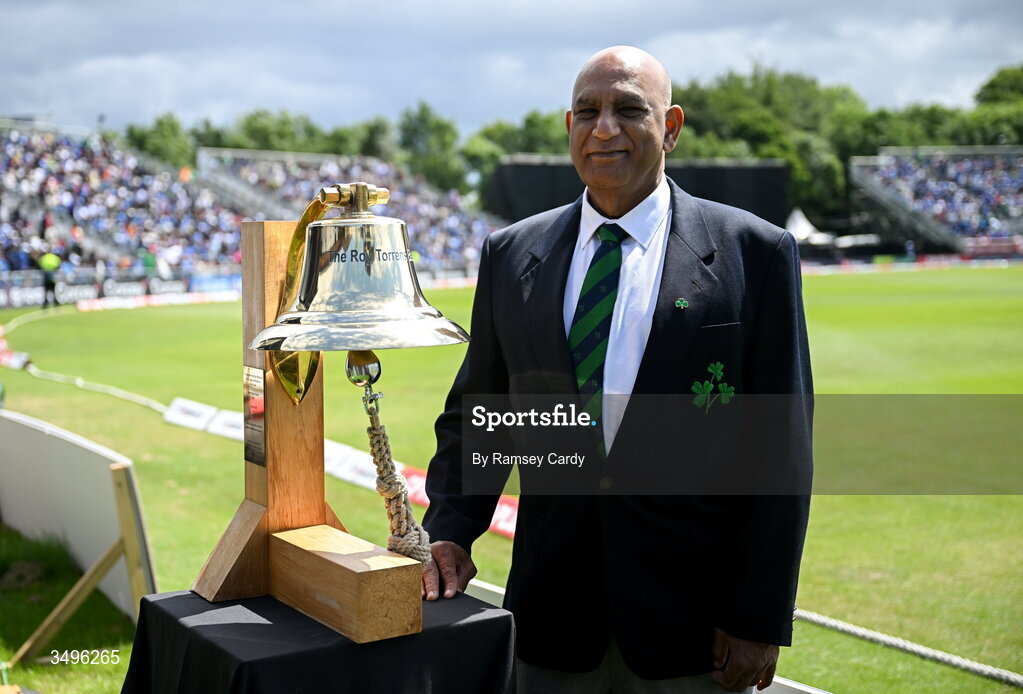 28 June 2026; Former Ireland and India international Bobby Rao rings The Roy Torrens Bell before match two of the Spinny Cup Men's T20 International series between Ireland and India at Stormont in Belfast. Photo by Ramsey Cardy/Sportsfile