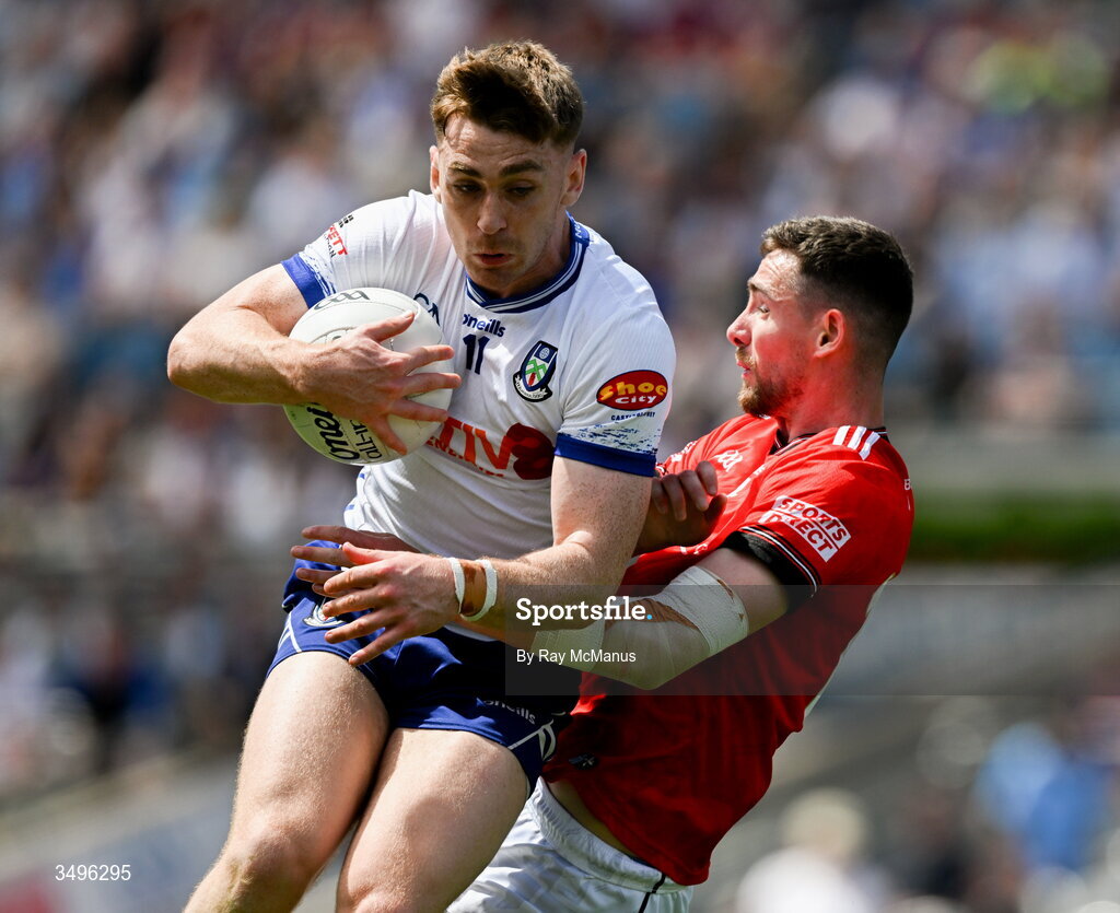 28 June 2026; Mícheál Bannigan of Monaghan is tackled by Ciaran Downey of Louth during the GAA Football All-Ireland Senior Championship quarter-final match between Louth and Monaghan at Croke Park in Dublin. Photo by Ray McManus/Sportsfile