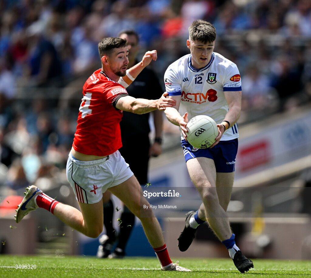 28 June 2026; Stephen O'Hanlon of Monaghan is tackled by Ciaran Downey of Louth during the GAA Football All-Ireland Senior Championship quarter-final match between Louth and Monaghan at Croke Park in Dublin. Photo by Ray McManus/Sportsfile
