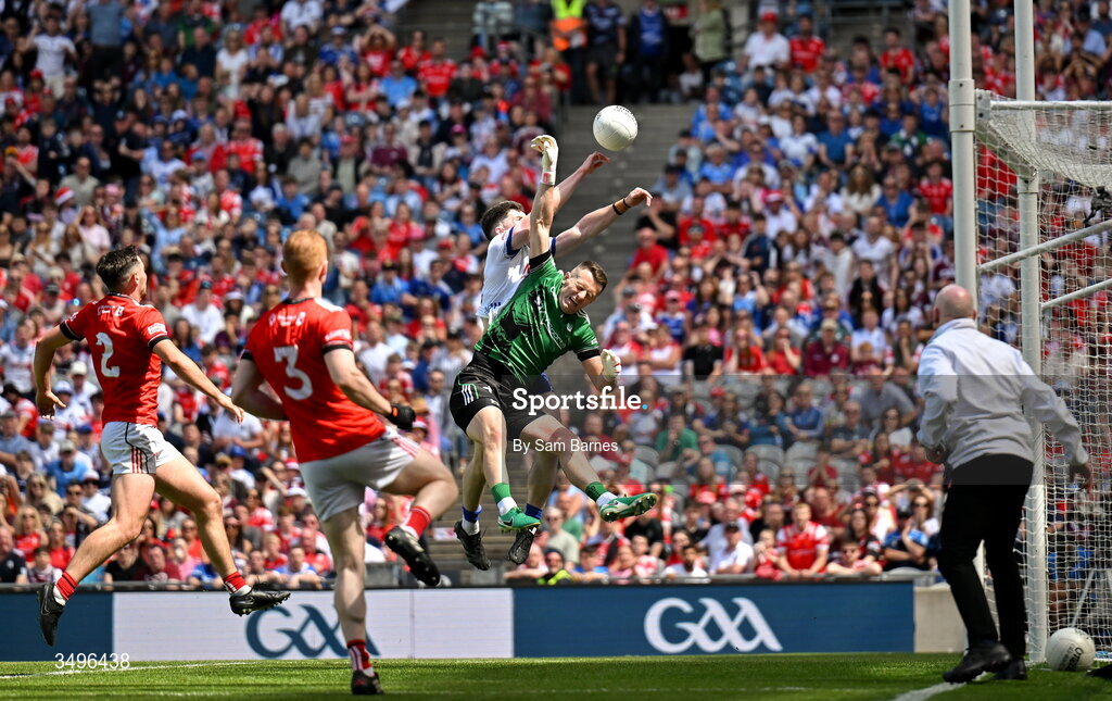 28 June 2026; Stephen O'Hanlon of Monaghan scores his side's second goal despite the efforts of Louth goalkeeper Niall McDonnell during the GAA Football All-Ireland Senior Championship quarter-final match between Louth and Monaghan at Croke Park in Dublin. Photo by Sam Barnes/Sportsfile
