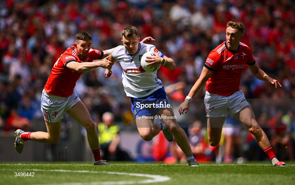 28 June 2026; Conor McCarthy of Monaghan in action against Ciaran Downey, left, and Ryan Burns of Louth during the GAA Football All-Ireland Senior Championship quarter-final match between Louth and Monaghan at Croke Park in Dublin. Photo by Piaras Ó Mídheach/Sportsfile