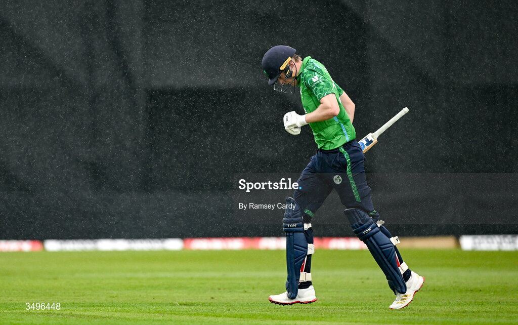28 June 2026; Harry Tector of Ireland makes his way off the pitch during a rain delay during match two of the Spinny Cup Men's T20 International series between Ireland and India at Stormont in Belfast.  Photo by Ramsey Cardy/Sportsfile