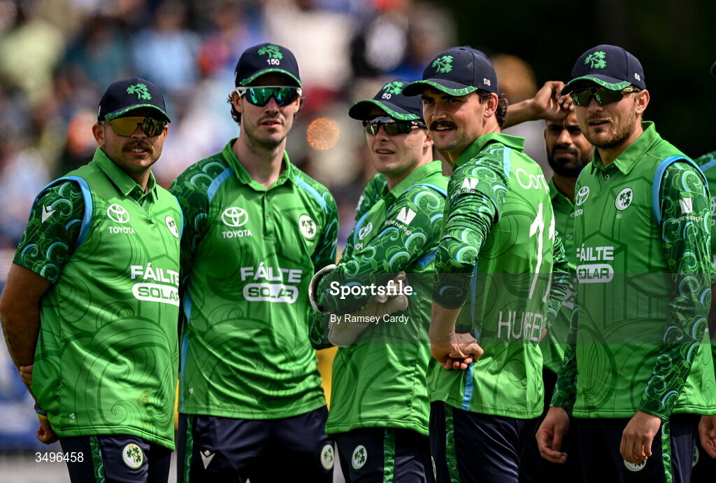 28 June 2026; Ireland players await a decision during match two of the Spinny Cup Men's T20 International series between Ireland and India at Stormont in Belfast.  Photo by Ramsey Cardy/Sportsfile