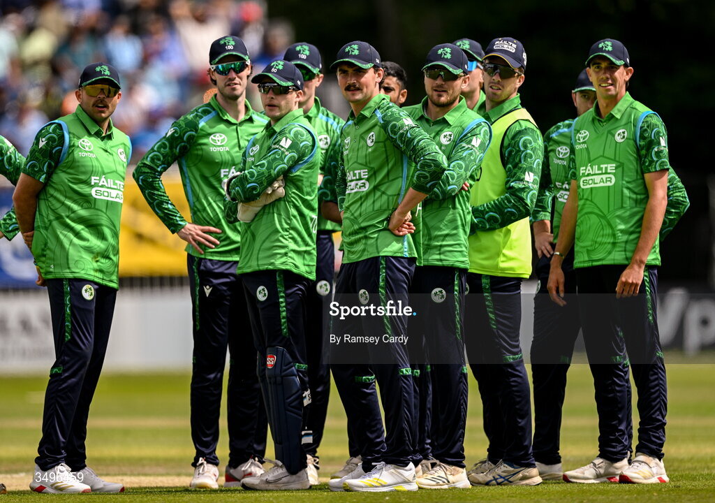 28 June 2026; Ireland players await a decision during match two of the Spinny Cup Men's T20 International series between Ireland and India at Stormont in Belfast.  Photo by Ramsey Cardy/Sportsfile