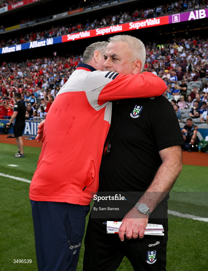 28 June 2026; Louth manager Gavin Devlin, left, embraces Monaghan manager Gabriel Bannigan after the GAA Football All-Ireland Senior Championship quarter-final match between Louth and Monaghan at Croke Park in Dublin. Photo by Sam Barnes/Sportsfile