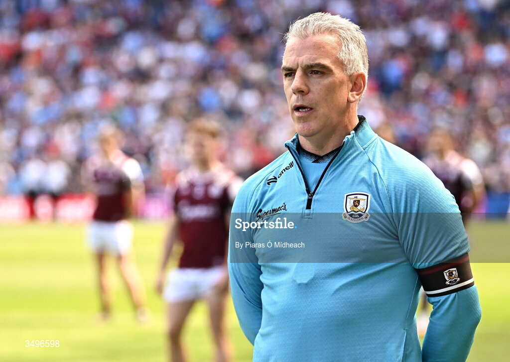 28 June 2026; Galway manager Pádraic Joyce during the pre-match minute's silence in memory of former Galway footballer Paul Clancy, who passed away recently, before the GAA Football All-Ireland Senior Championship quarter-final match between Dublin and Galway at Croke Park in Dublin. Photo by Piaras Ó Mídheach/Sportsfile