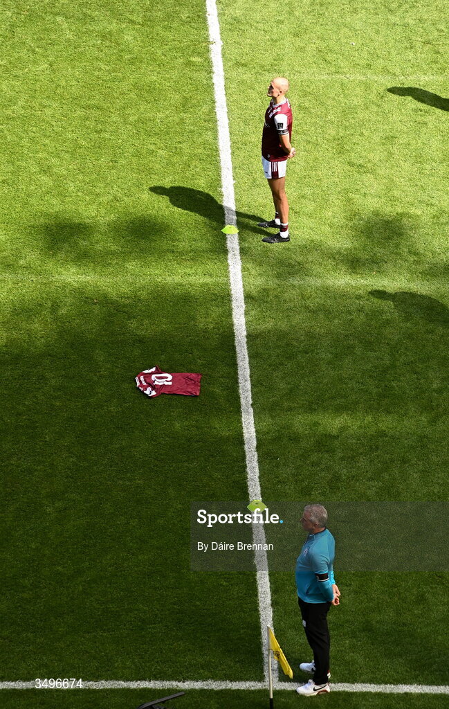 28 June 2026; Galway manager Pádraic Joyce and John Maher of Galway stand for a minute's silence, while the Galway number 10 jersey is laid out in honour of former Galway footballer Paul Clancy, who died during the week, ahead of the GAA Football All-Ireland Senior Championship quarter-final match between Dublin and Galway at Croke Park in Dublin. Photo by Daire Brennan/Sportsfile