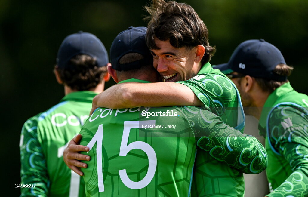 28 June 2026; Matthew Hollard, right, and Ross Adair of Ireland celebrate the wicket of Abhishek Sharma of India during match two of the Spinny Cup Men's T20 International series between Ireland and India at Stormont in Belfast. Photo by Ramsey Cardy/Sportsfile