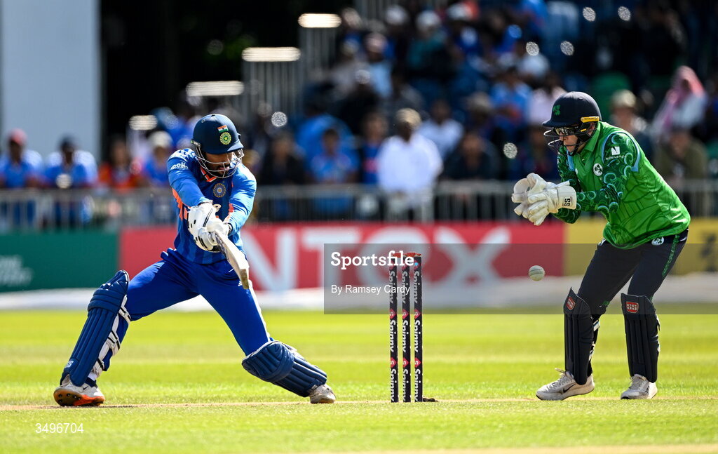 28 June 2026; Tilak Varma of India and Ireland wicketkeeper Lorcan Tucker during match two of the Spinny Cup Men's T20 International series between Ireland and India at Stormont in Belfast.  Photo by Ramsey Cardy/Sportsfile