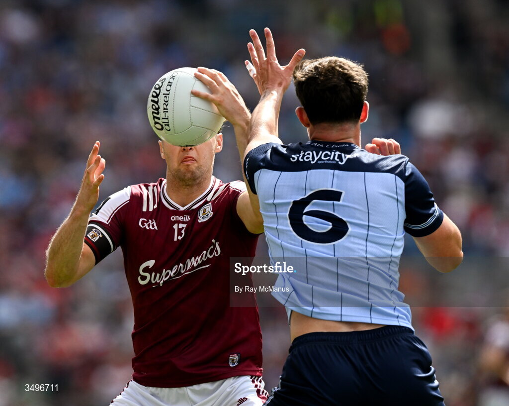 28 June 2026; Robert Finnerty of Galway is tackled by Theo Clancy of Dublin during the GAA Football All-Ireland Senior Championship quarter-final match between Dublin and Galway at Croke Park in Dublin. Photo by Ray McManus/Sportsfile