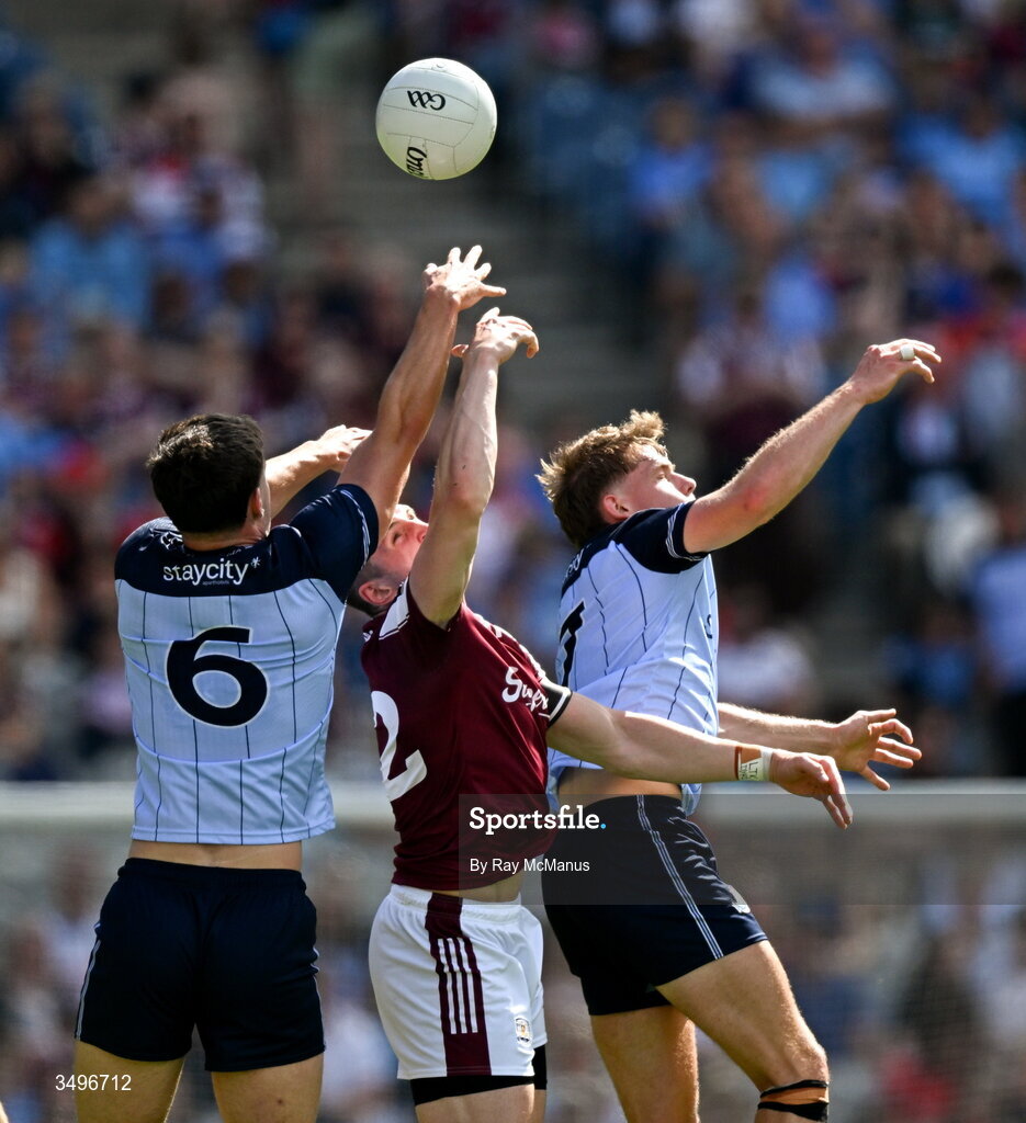 28 June 2026; Dublin players Theo Clancy and Charlie McMorrow in action against Cillian McDaid of Galway during the GAA Football All-Ireland Senior Championship quarter-final match between Dublin and Galway at Croke Park in Dublin. Photo by Ray McManus/Sportsfile
