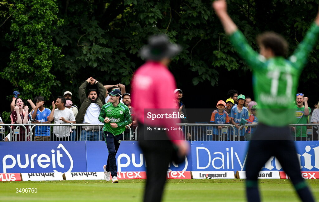 28 June 2026; George Dockrell of Ireland celebrates taking the wicket of Shivam Dube of India during match two of the Spinny Cup Men's T20 International series between Ireland and India at Stormont in Belfast.  Photo by Ramsey Cardy/Sportsfile