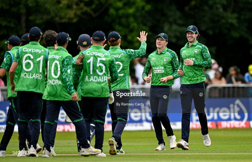 28 June 2026; George Dockrell of Ireland, right, celebrates taking the wicket of Shivam Dube of India during match two of the Spinny Cup Men's T20 International series between Ireland and India at Stormont in Belfast.  Photo by Ramsey Cardy/Sportsfile