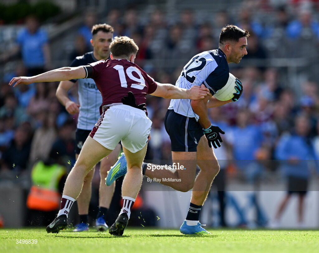 28 June 2026; Niall Scully of Dublin is tackled by Johnny McGrath of Galway during the GAA Football All-Ireland Senior Championship quarter-final match between Dublin and Galway at Croke Park in Dublin. Photo by Ray McManus/Sportsfile