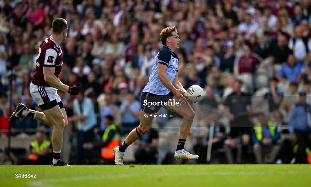 28 June 2026; Charlie McMorrow of Dublin races past Cein Darcy of Galway during the GAA Football All-Ireland Senior Championship quarter-final match between Dublin and Galway at Croke Park in Dublin. Photo by Ray McManus/Sportsfile