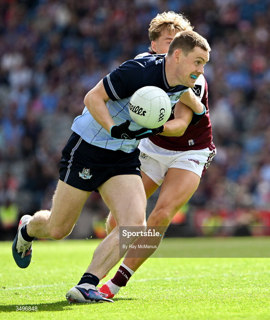 28 June 2026; Con O'Callaghan of Dublin is tackled by Cian Hernon of Galway during the GAA Football All-Ireland Senior Championship quarter-final match between Dublin and Galway at Croke Park in Dublin. Photo by Ray McManus/Sportsfile