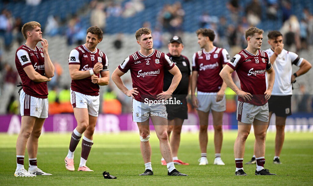 28 June 2026; Jack Glynn of Galway, centre, and teammates after their side's defeat in the GAA Football All-Ireland Senior Championship quarter-final match between Dublin and Galway at Croke Park in Dublin. Photo by Seb Daly/Sportsfile