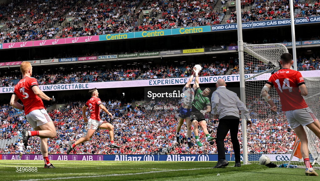 28 June 2026; Stephen O'Hanlon of Monaghan scores his side's second goal despite the efforts of Louth goalkeeper Niall McDonnell during the GAA Football All-Ireland Senior Championship quarter-final match between Louth and Monaghan at Croke Park in Dublin. Photo by Sam Barnes/Sportsfile