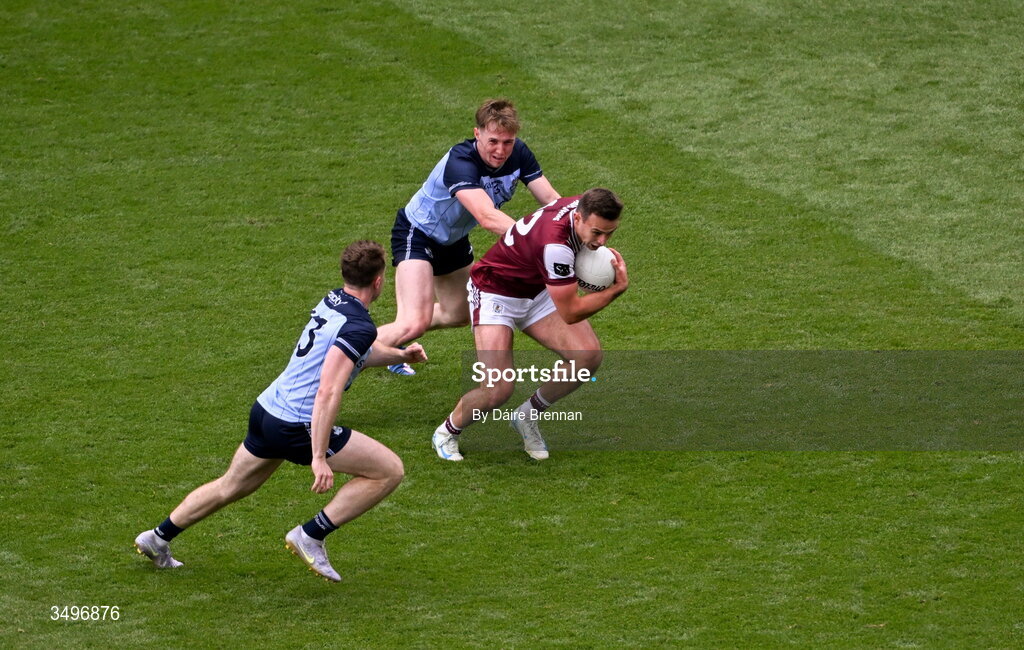 28 June 2026; Cein Darcy of Galway in action against Paddy Small, left, and Eoin Kennedy of Dublin during the GAA Football All-Ireland Senior Championship quarter-final match between Dublin and Galway at Croke Park in Dublin. Photo by Daire Brennan/Sportsfile