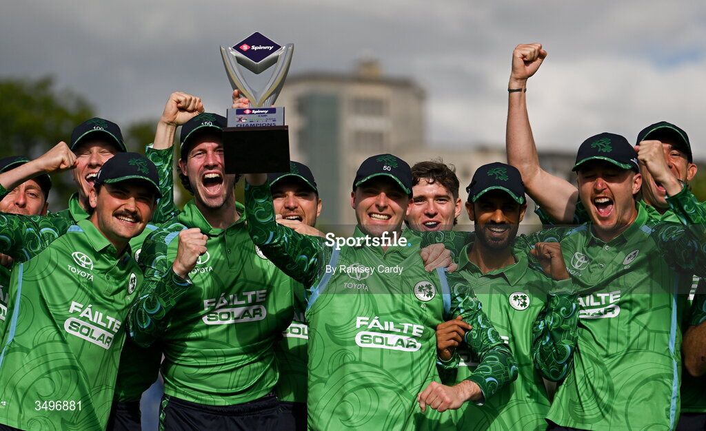 28 June 2026; Ireland captain Lorcan Tucker lifts the trophy after their series victory in the Spinny Cup Men's T20 International series between Ireland and India at Stormont in Belfast. Photo by Ramsey Cardy/Sportsfile