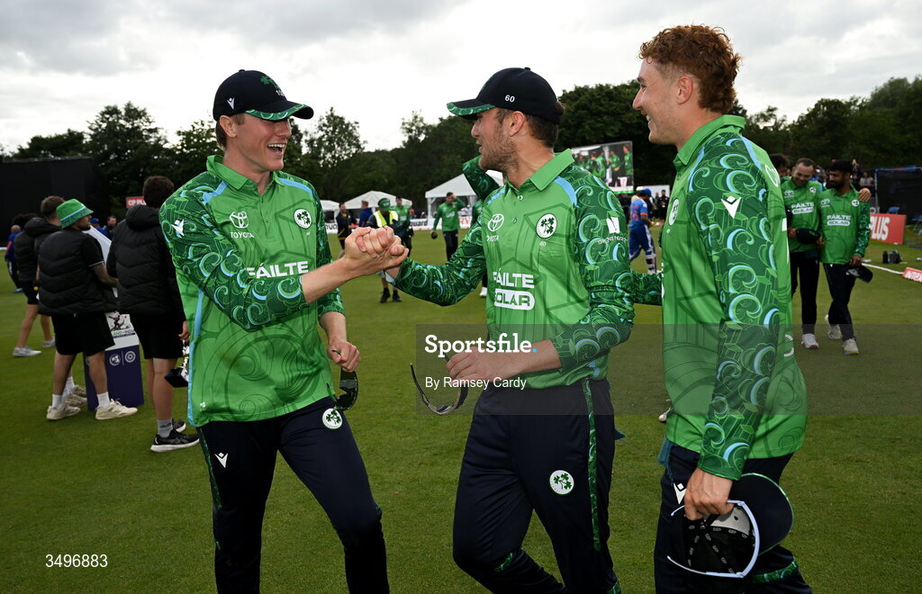 28 June 2026; Ireland players, from left, Harry Tector, Tim Tector and Ben Calitz celebrates after match two of the Spinny Cup Men's T20 International series between Ireland and India at Stormont in Belfast. Photo by Ramsey Cardy/Sportsfile