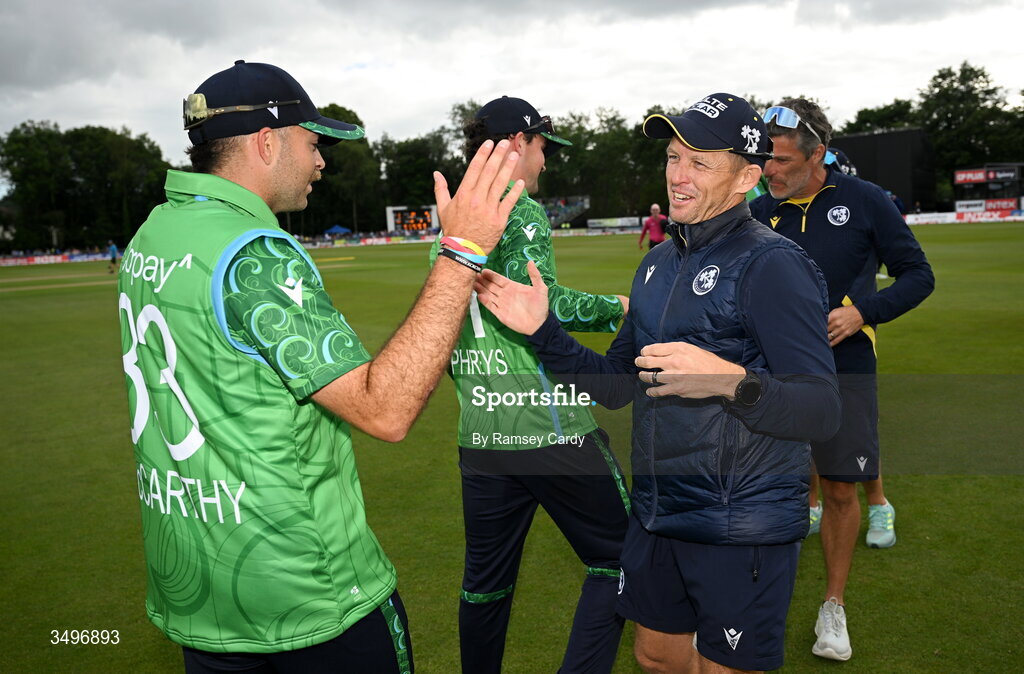 28 June 2026; Ireland head coach Heinrich Malan and Liam McCarthy celebrate after match two of the Spinny Cup Men's T20 International series between Ireland and India at Stormont in Belfast. Photo by Ramsey Cardy/Sportsfile